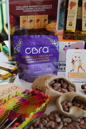 stand de CORA + Vibra Gratitud de Corre La Voz
